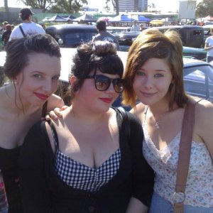 My friend's sister, my friend and me, at a car show.