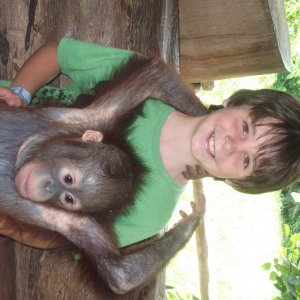 dyaln holding the same orangutan