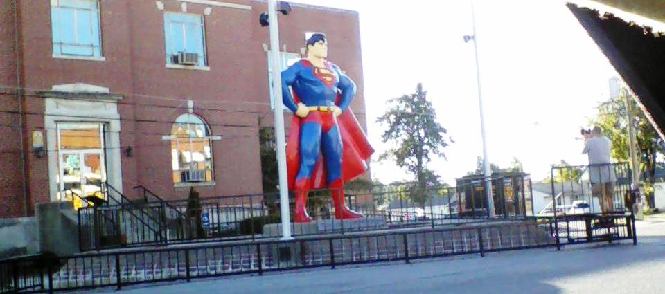 Metropolis, Illinois: Home of Superman! 

(also, Chester, IL is the home of Popeye)