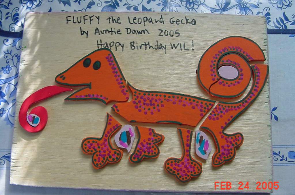 This is a wooden puzzle I made of my lizard, Fluffy.