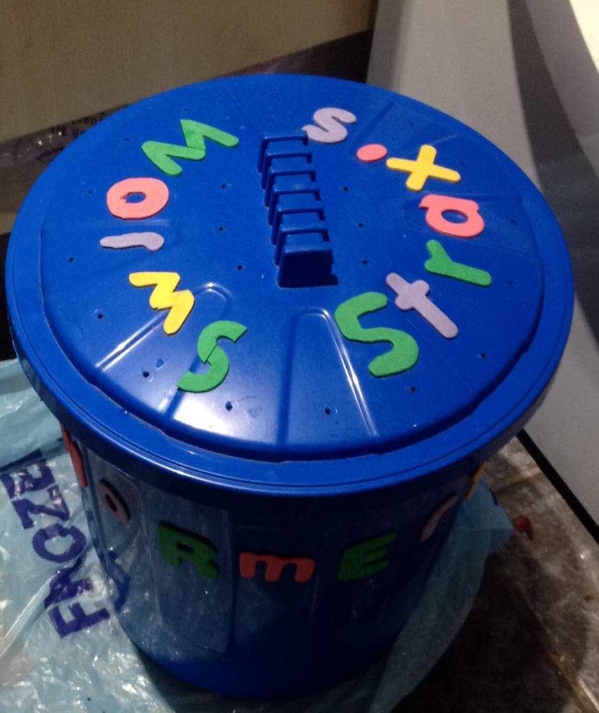 Worm bin with added decoration (kids foam letter stickers!)